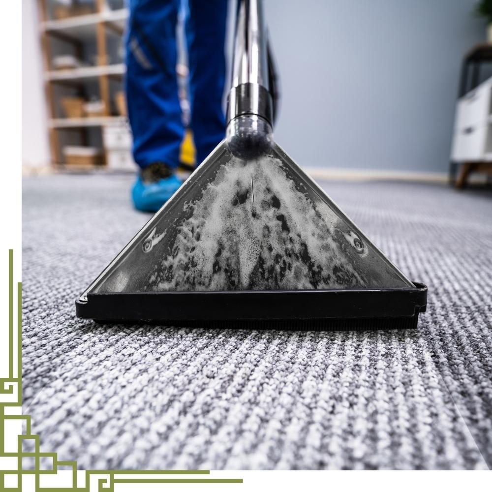 Professional carpet cleaning service removing deep stains and embedded dirt from a residential carpet in Connecticut